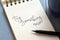 TRY SOMETHING NEW hand-lettered in notepad