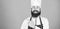 Try something special. Special offer from chef. Confident bearded happy chef white uniform. My secret tips culinary