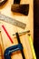 Try square , wood pencil, hammer, saw, clamp, Chisel, vise, tape measure, file for carpenter on wooden background tool woodcraft