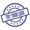 TRY YOUR LUCK text written on blue vintage round stamp