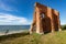 Trzesacz, Zachodniopomorskie / Poland - August, 29, 2020: Ruins of the church on the Baltic Sea. Brick building damaged by waves