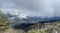 Tseylomsky pass in Ingushetia. A trip uphill to the Tsei Loam pass on a cloudy spring day. Panorama of the high cliffs