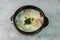 tteok mandu guk, Korean style dumpling soup with sliced rice cake