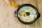 tteok mandu guk, Korean style dumpling soup with sliced rice cake