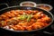 Tteokbokki, chewy rice cakes bathed in a sweet and spicy gochujang sauce