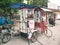 Tual, Indonesia - october 24, 2018: funny petrol pump gas station mounted on motorbike kart in Tual, kei islands, moluccas,