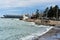 Tuapse, Russia, - December 26, 2020. Port of small town of Tuapse in south of Russia, people feed bread to arriving gulls, wild