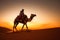 Tuareg riding a camel in desert at sunset. Generative Ai