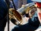 Tuba in the hands of a brass band musician