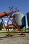 Tube elevator and grain bins in a small town