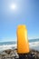 Tube with sun protection on beach of ocean