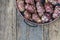 Tuber Jerusalem artichokes on wooden table with copy space