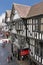 Tudor buildings in Eastgate street. Chester. England