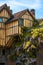 Tudor timber framed building next to The Priory Gate