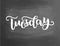 Tuesday. Handwriting font by calligraphy. Vector illustration on blackboard background. EPS 10. Brush chalk lettering