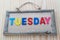 Tuesday word with colorful letter