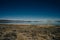 Tufa columns reflected in the mirrored water surface at Mono Lake, California