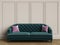 Tufted green sofa with pink pillows in classic interior with cop