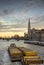 Tug boat towing cargo barge at london river