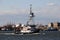 Tugboat ANDREA passing Kill Van Kull strait eastward on background of Bayonne, NJ