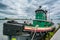 A tugboat docked on the Delaware River, at Penn`s Landing, in Philadelphia, Pennsylvania