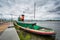 A tugboat docked on the Delaware River, at Penn`s Landing, in Philadelphia, Pennsylvania