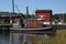 Tugboat docked in marina