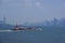 Tugboat pushing barge in New York Harbor,