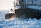 Tugboat in thick Lake Michigan ice