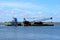 Tugboat towing barge background
