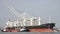 Tugboats assist bulk carrier BUNUN ACE to manuever