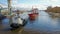 Tugboats assisting cargo ship sea in the morning.