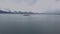 Tugboats and barges anchored in safe Alaska bay