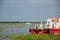 Tugboats and fisherman`s boat in the Magdalena river. Colombia