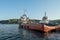 Tugboats moored on the shore of the Bosphorus channel