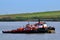 Tugs moored in River Thames