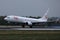 TUI Airways, white livery plane landing on airport