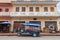 Tuk-tuk and old building in Luang Prabang