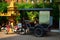 Tuk tuk in Phnom Penh, Cambodia, close to a buddhist temple.