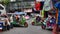 Tuk Tuk Tricycle in busy market in Bangkok downtown