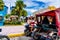 Tuktuk Tricycle taxi`s and motorcycle on Central Square of Iquitos, 2018