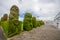 TULCAN, ECUADOR - JULY 3, 2016: human like sculptures on the side of the path on the cemetery