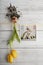 Tulip bulb and picture with easter bunny hanging on ribbon