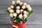 Tulip `Ice Cream` As a result of selection flowers in metal bucket wooden background