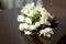 Tulip wedding bouquet with rings on table