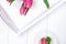 Tulips and dessert macaroon on a white background. Magenta color