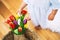 Tulips flowers in wicker straw basket