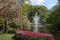 Tulips, fountain, trees, lake, Keukenhof gardens