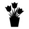 Tulips in pot silhouette icon. Tulip in flowerpot vector illustration isolated on white