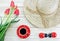 Tulips,straw hat ,saucer with coffee and wooden lady bugs ornaments